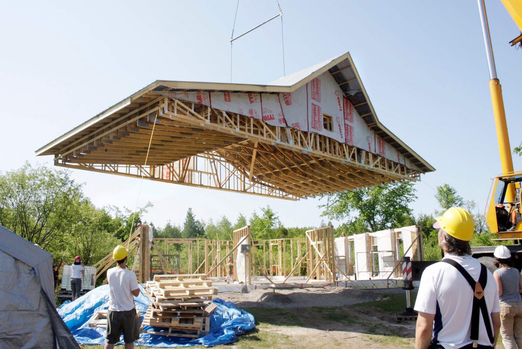 Craning a roof into place