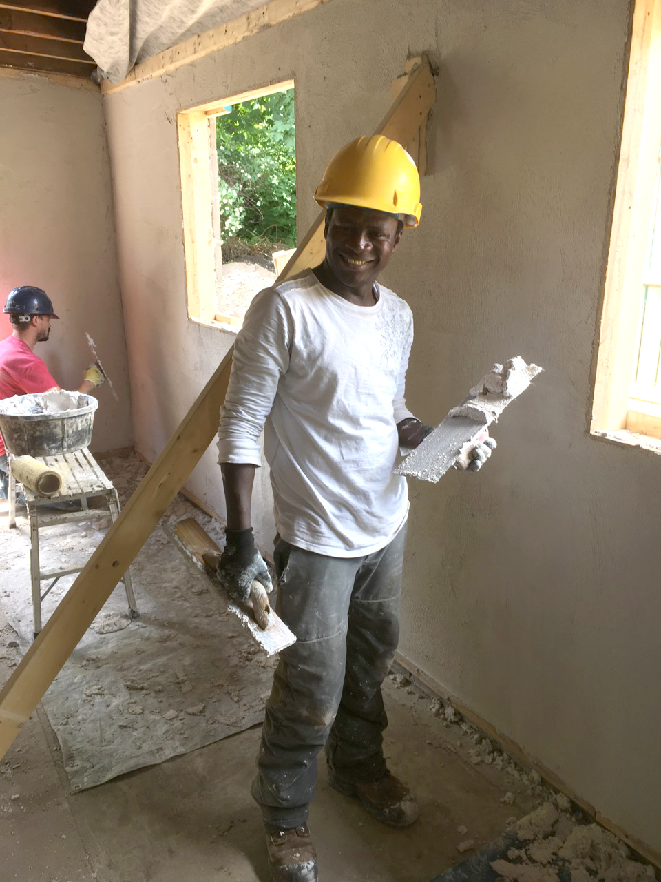George 4 Image of man wearing hard hat in building under construction