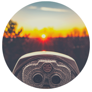 binoculors looking into sunset